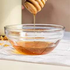 Honey trap to kill fruit flies